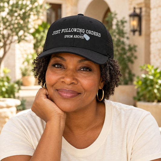 Lifestyle photo of Just Following Orders – Trucker Hat worn by a model