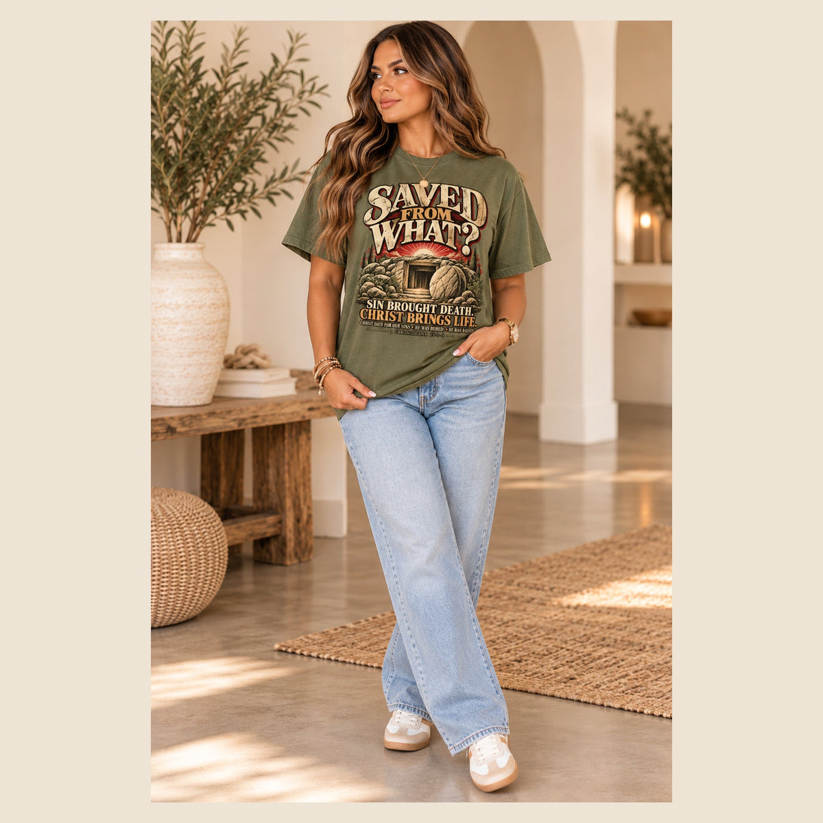 Full-body model wearing Sage Saved From What tee in warm ivory boutique square photograph